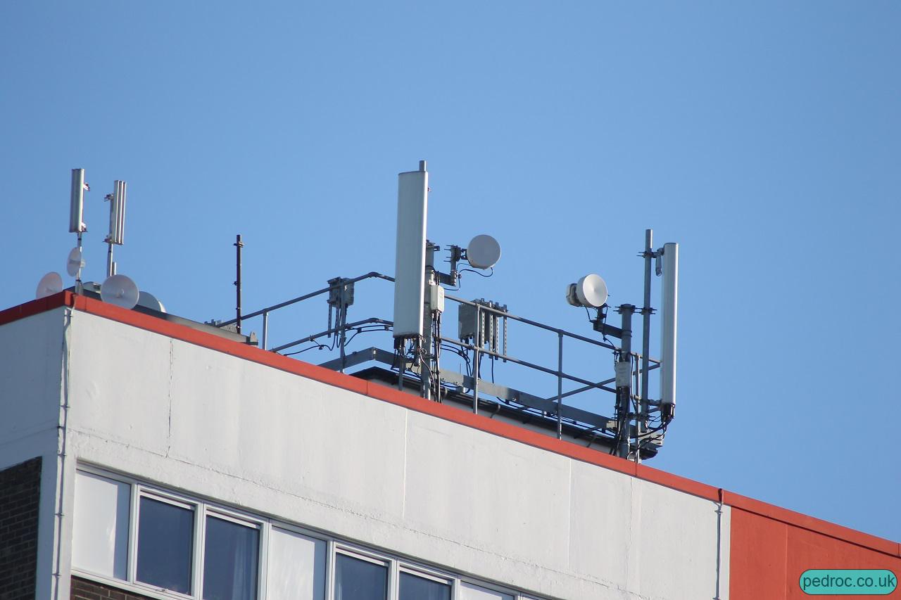 EE and 3 Mast on the red tower block at Great Thornton street. Huawei AQU4518R0 antennas.