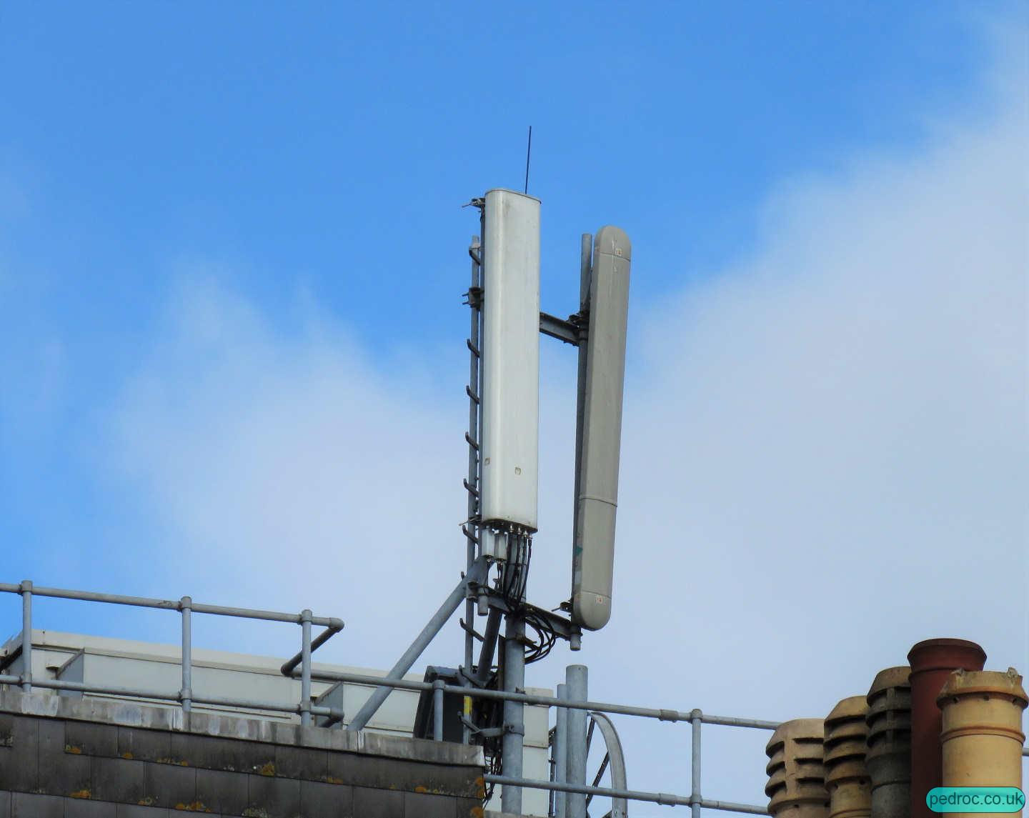 Vodafone Host with O2 with Nokia radio closeup of rooftop mast near the centre of Southampton.